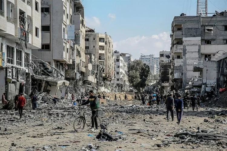İsrail'in Gazze'ye saldırılarında öldürülenlerin sayısı 128 bini aştı