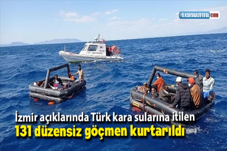 İzmir açıklarında Türk kara sularına itilen 131 düzensiz göçmen kurtarıldı